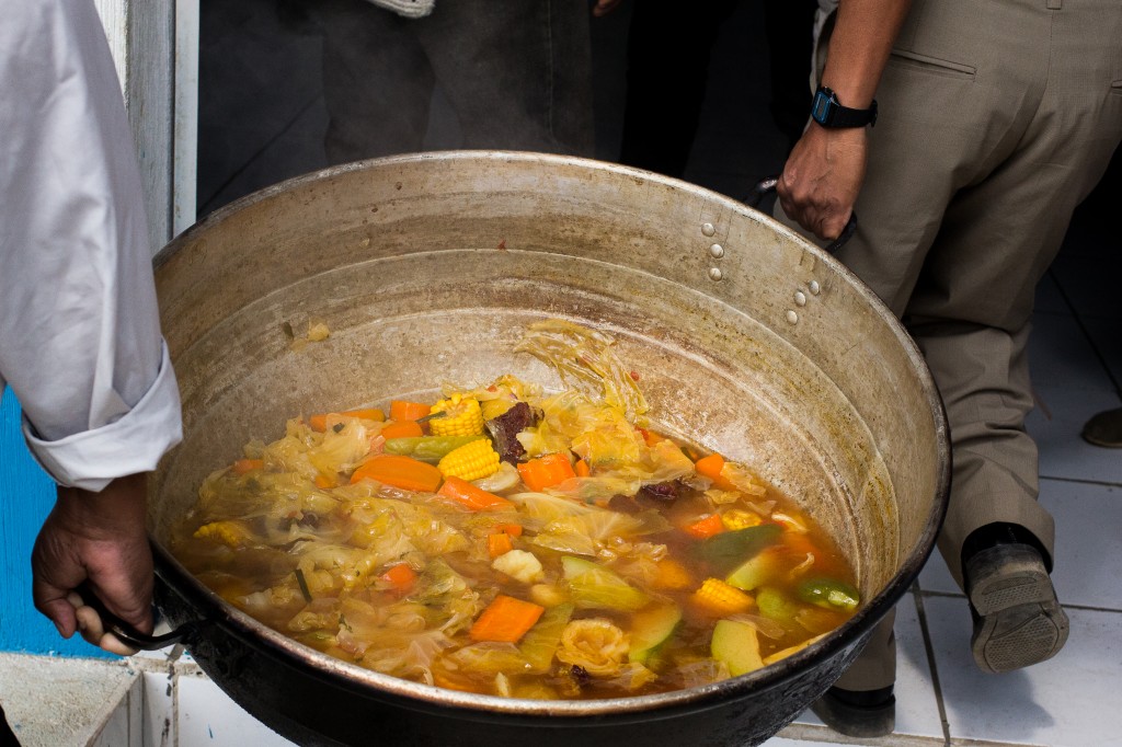 Men In Xojola Deliver Lunch